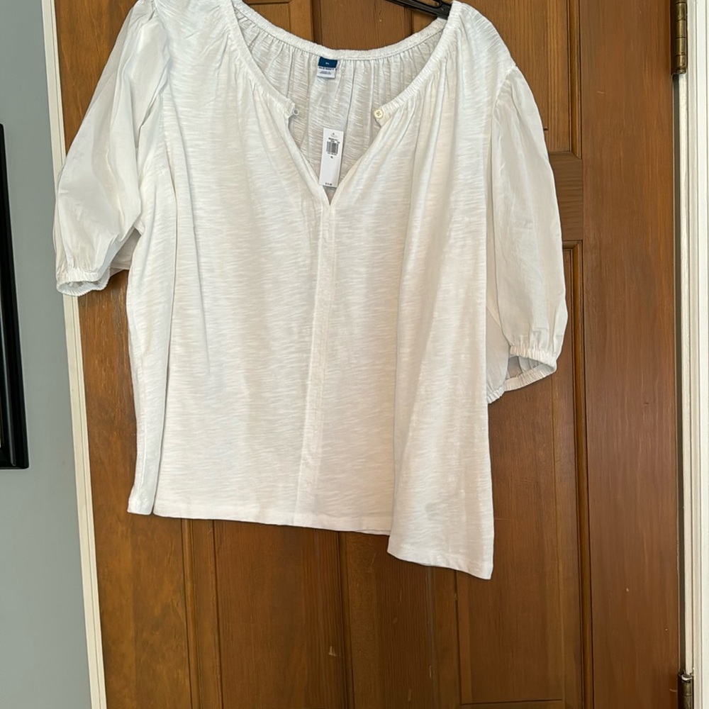 Brand new shirt with tags, a great white shirt, light and Airy for Summer